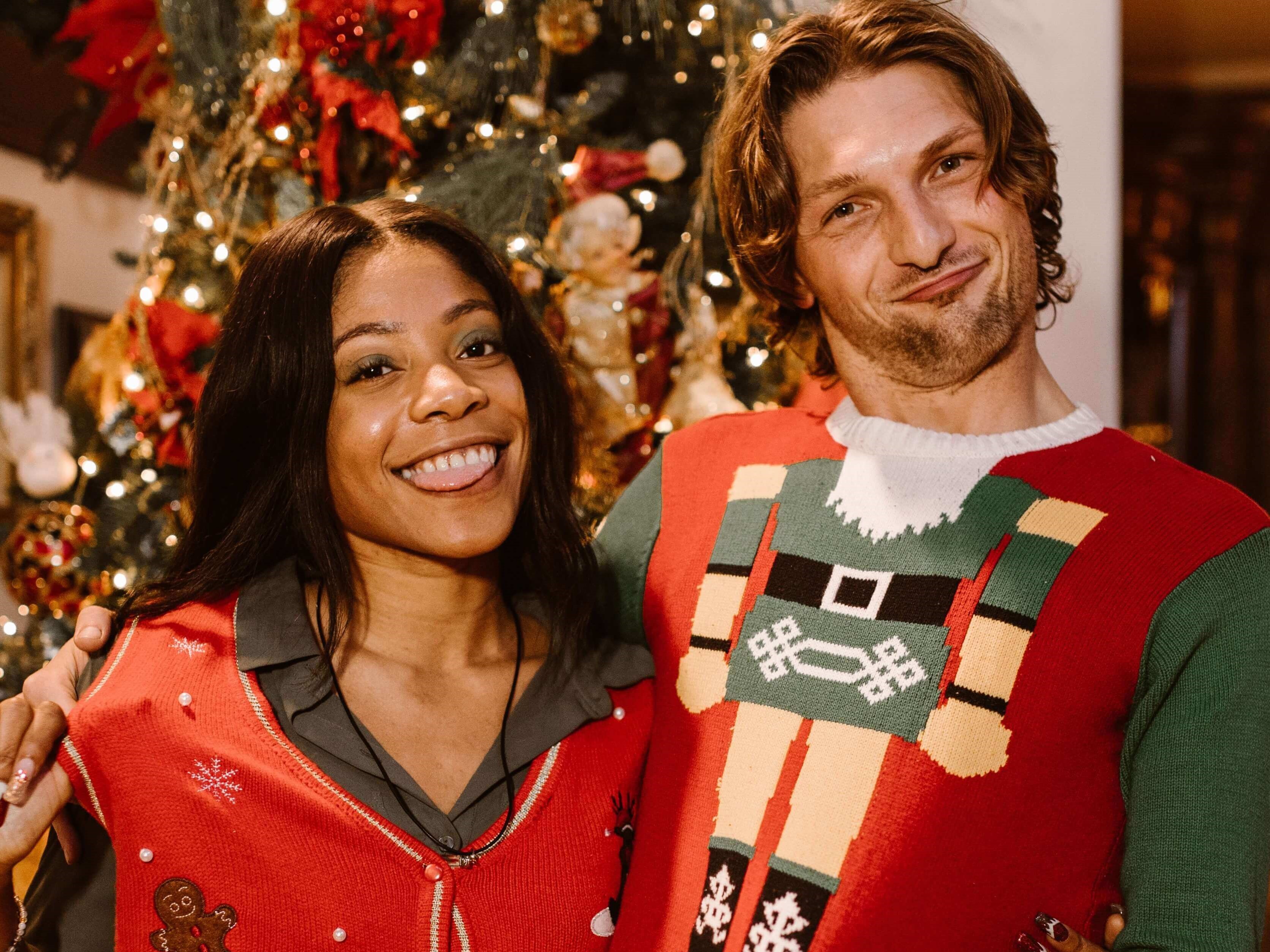 A happy couple dressed in festive attire